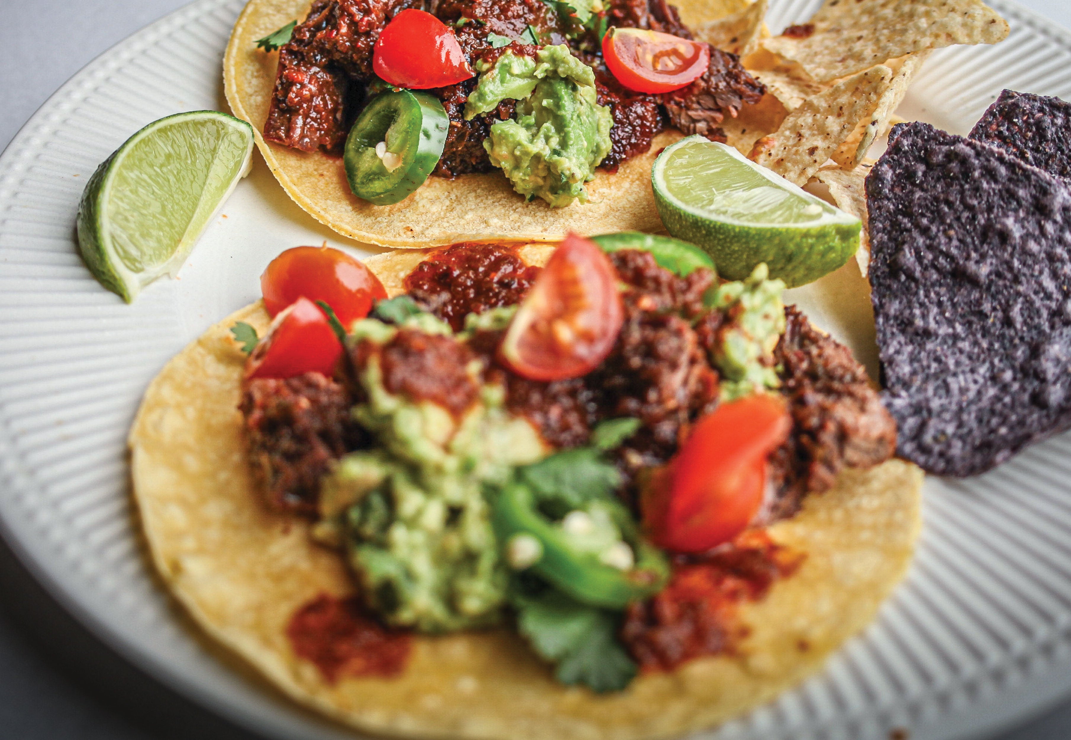 HOT HONEY SKIRT STEAK TACOS WITH AVOCADO RELISH